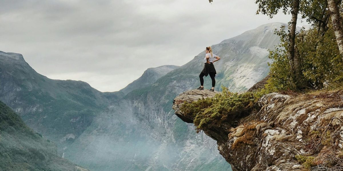 pexels-julie-aagaard-1374064-scaled runner standing on top of a mountain